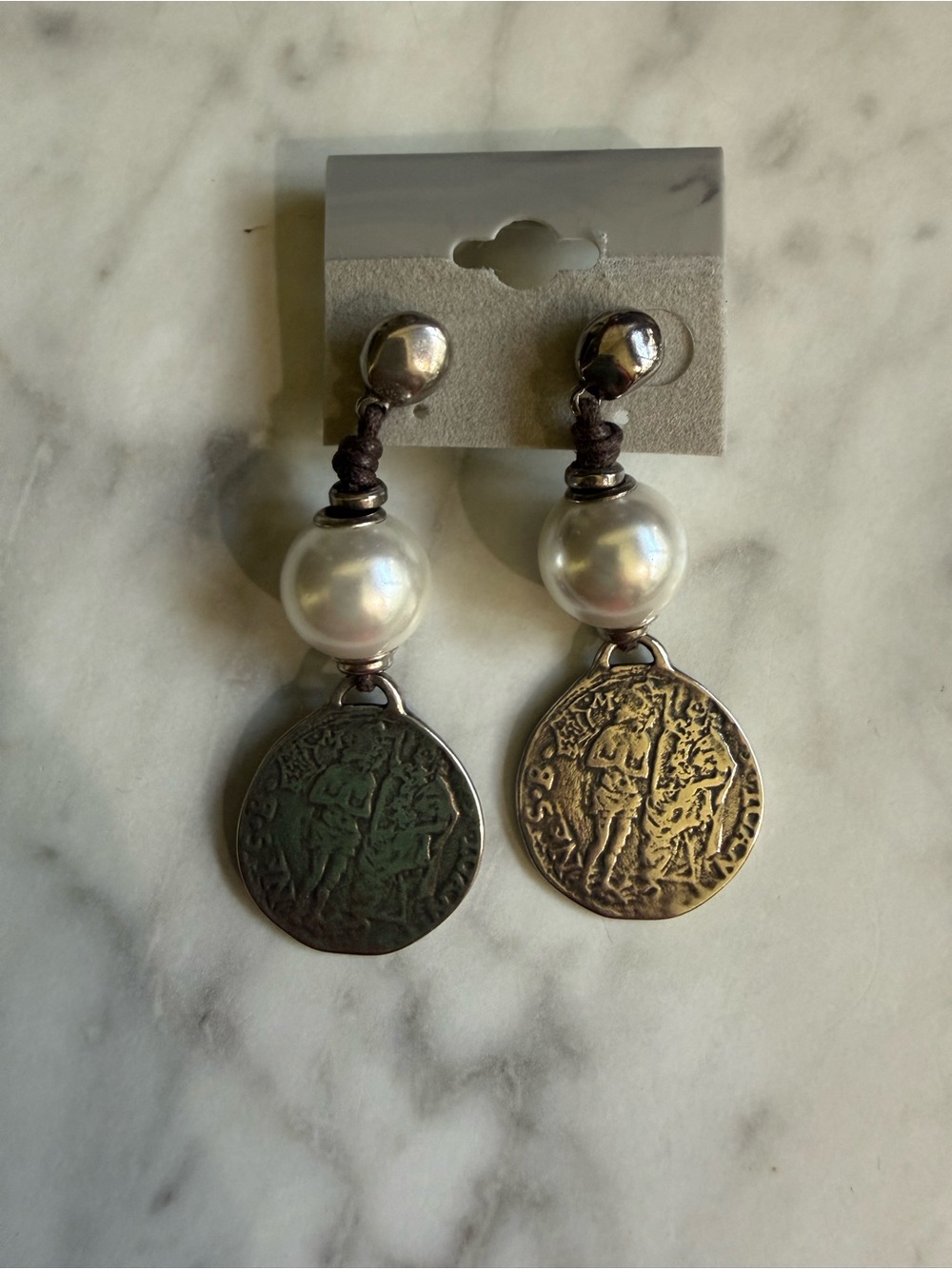 Uno de 50 earings